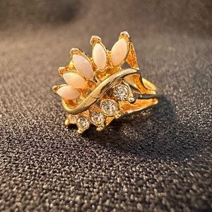 Gold tone ring sz 5 with 5 faux opal and 5 clear stones beautiful cocktail ring